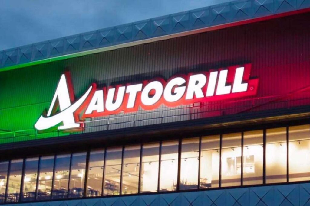 Insegna Autogrill con luci tricolore italiane