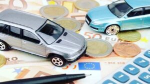 Modellini auto e soldi