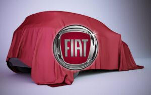 Auto sotto un telo e logo Fiat