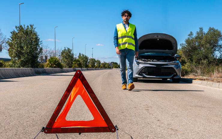 Giubbotto catarifrangente e triangolo